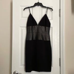 Black, spaghetti strap dress with lamb skin trim